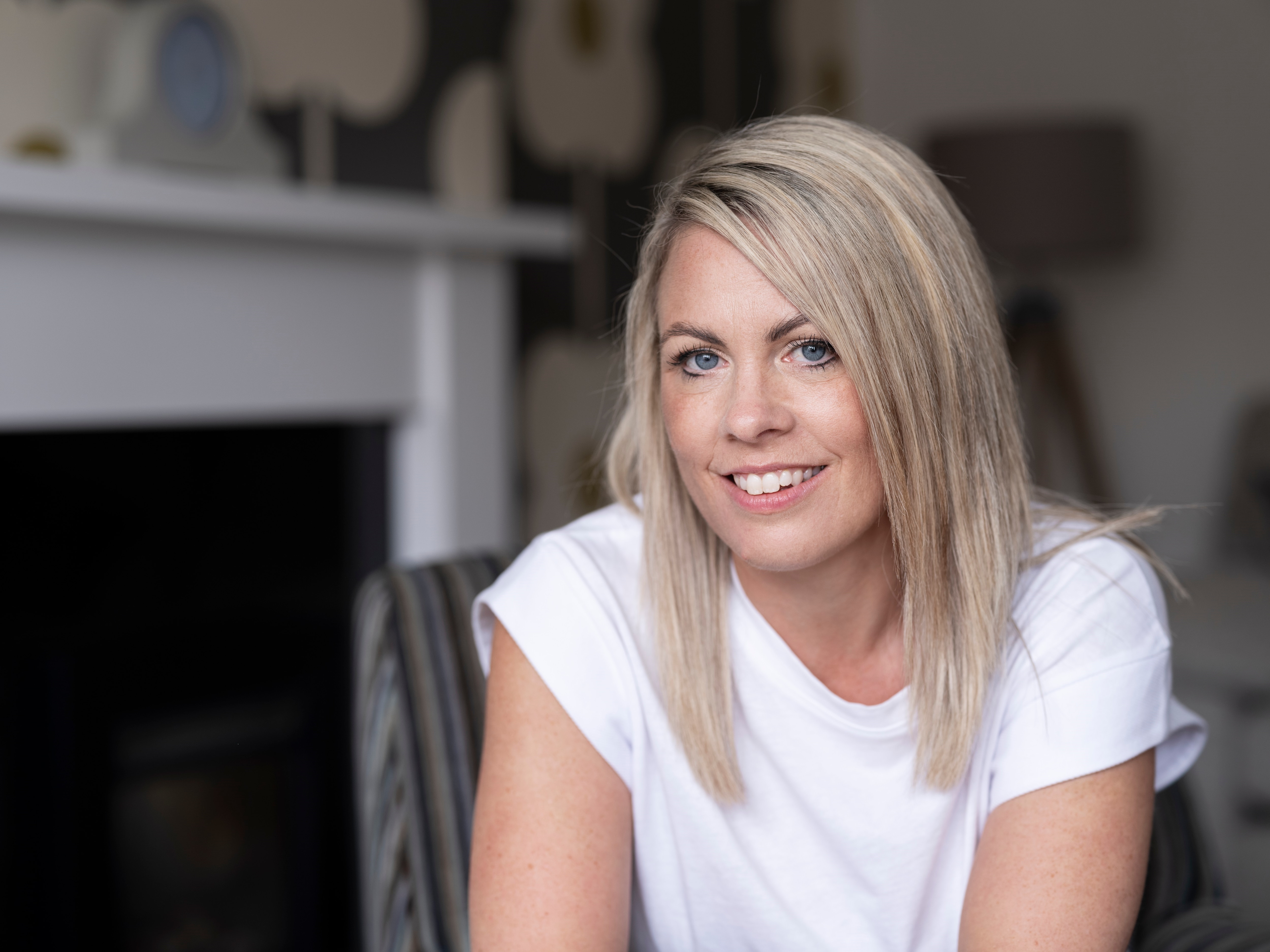 Laura, an intermittent catheter and Peristeen Plus user, sitting.